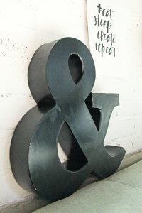 Ampersand of en-teken van ijzer bij quip&Co